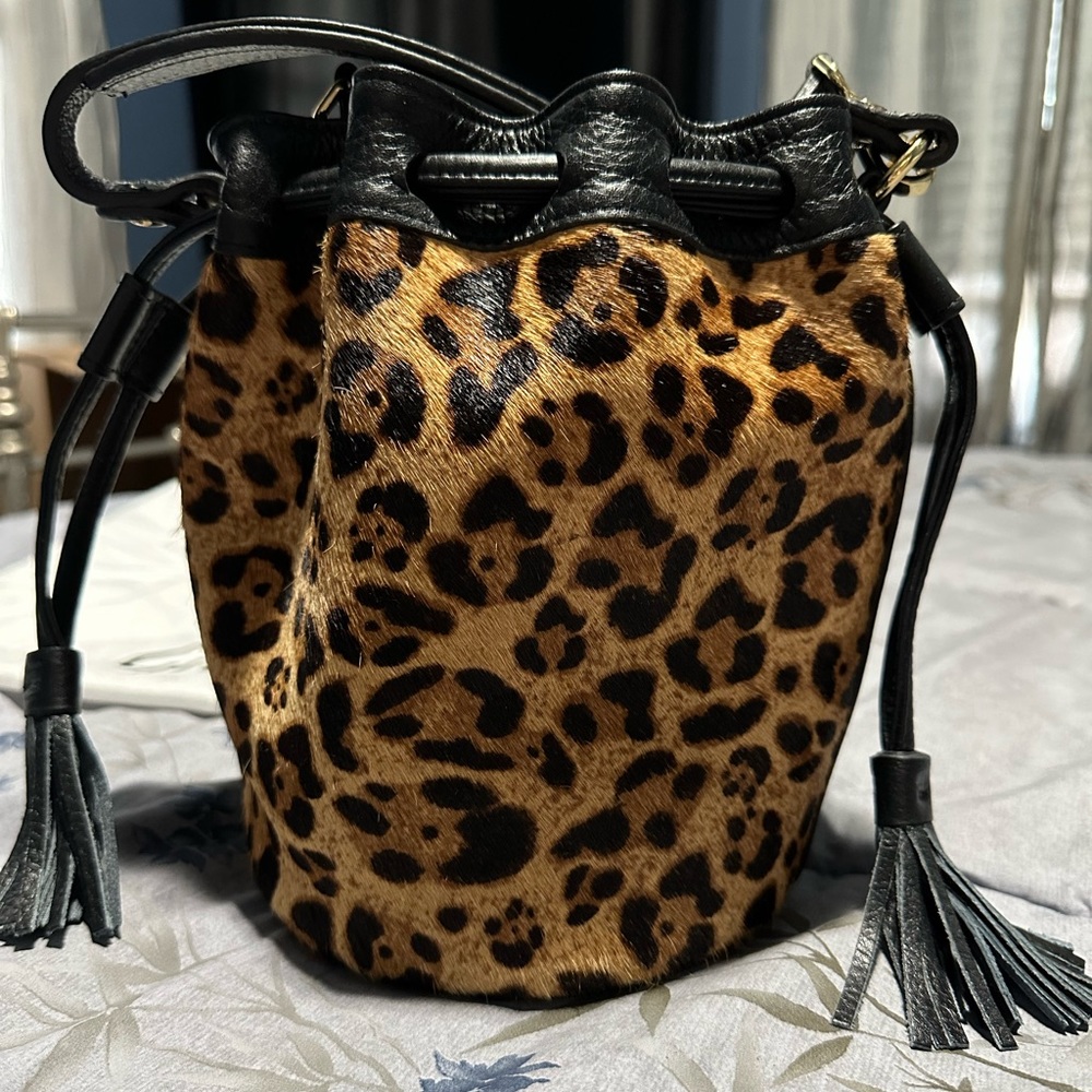 Genevieve bucket bag in leopard haircalf by GiGi New York.